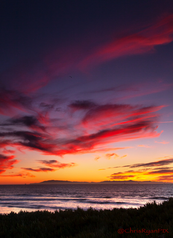 Sunset over Santa Cruz Island of Channel Islands along Ventura Shoreline
