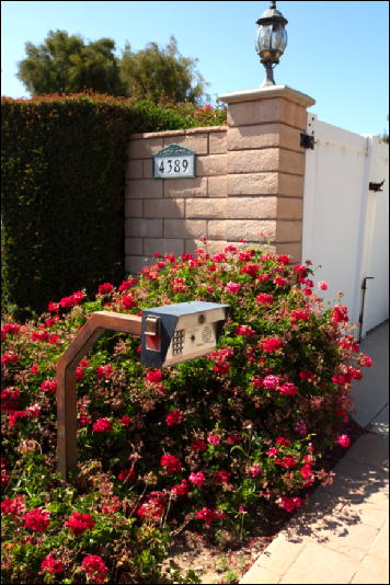 Real Estate Photo of entry gate with flowers (ChrisRyanPIX)