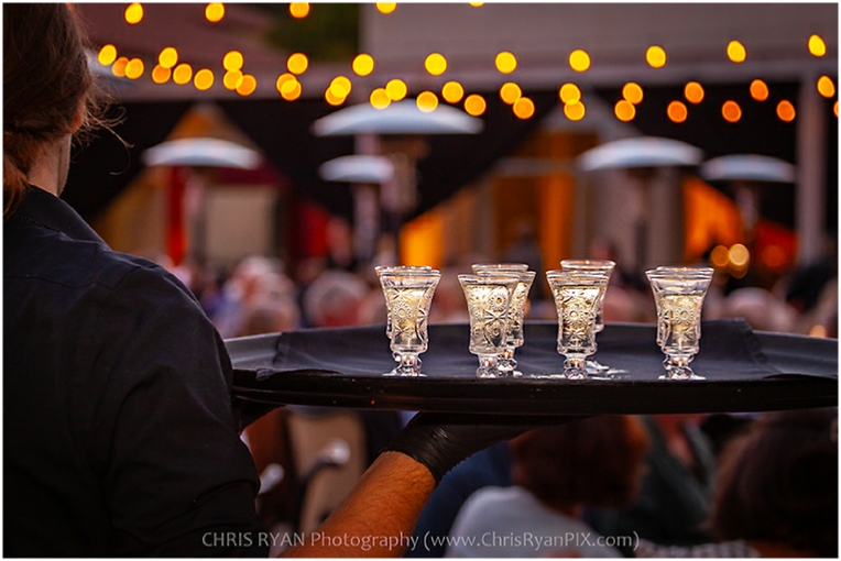 Event photographer captures cocktails under patio lights
