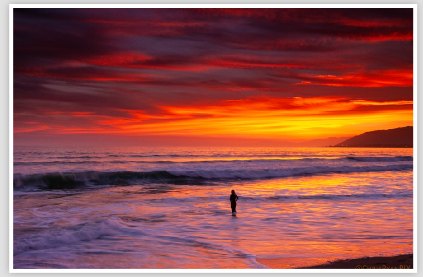 Surfer waiting for ocean waves
